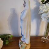 Religious statuette of the Virgin Mary in bisque porcelain