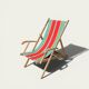 Vintage deck chair with striped green and red fabric, original patina.