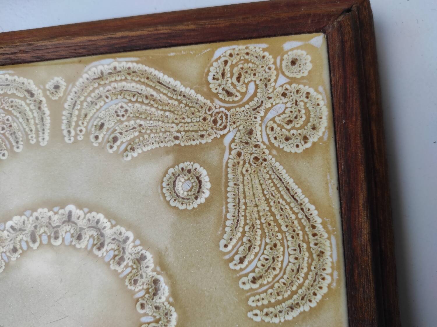 Wooden and ceramic trivet