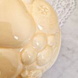 Vintage yellow pitcher in fruit slip