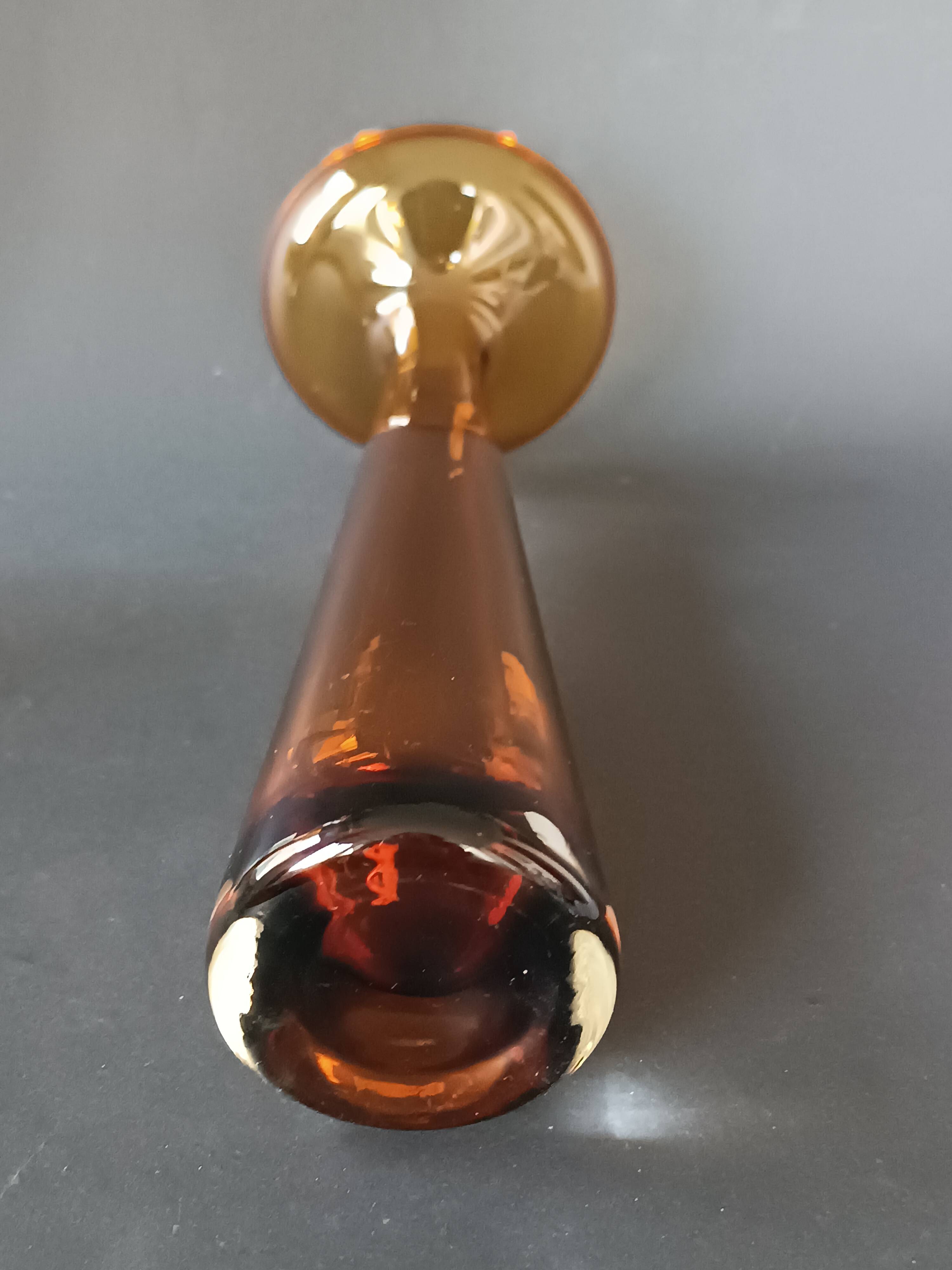 Two vintage Scandinavian double-layered amber blown glass candlesticks