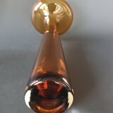 Two vintage Scandinavian double-layered amber blown glass candlesticks