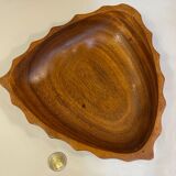 Carved wooden pocket emptier