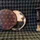 Very old round pocket mirror and leather case, 18th century