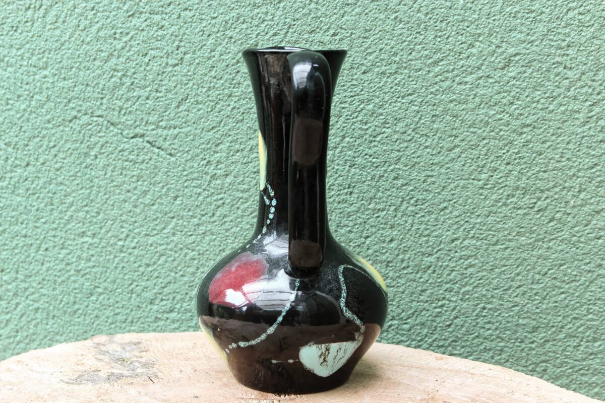 Poet Laval ceramic pitcher