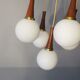 Danish brass and teak cascading 5-globe chandelier, 1960