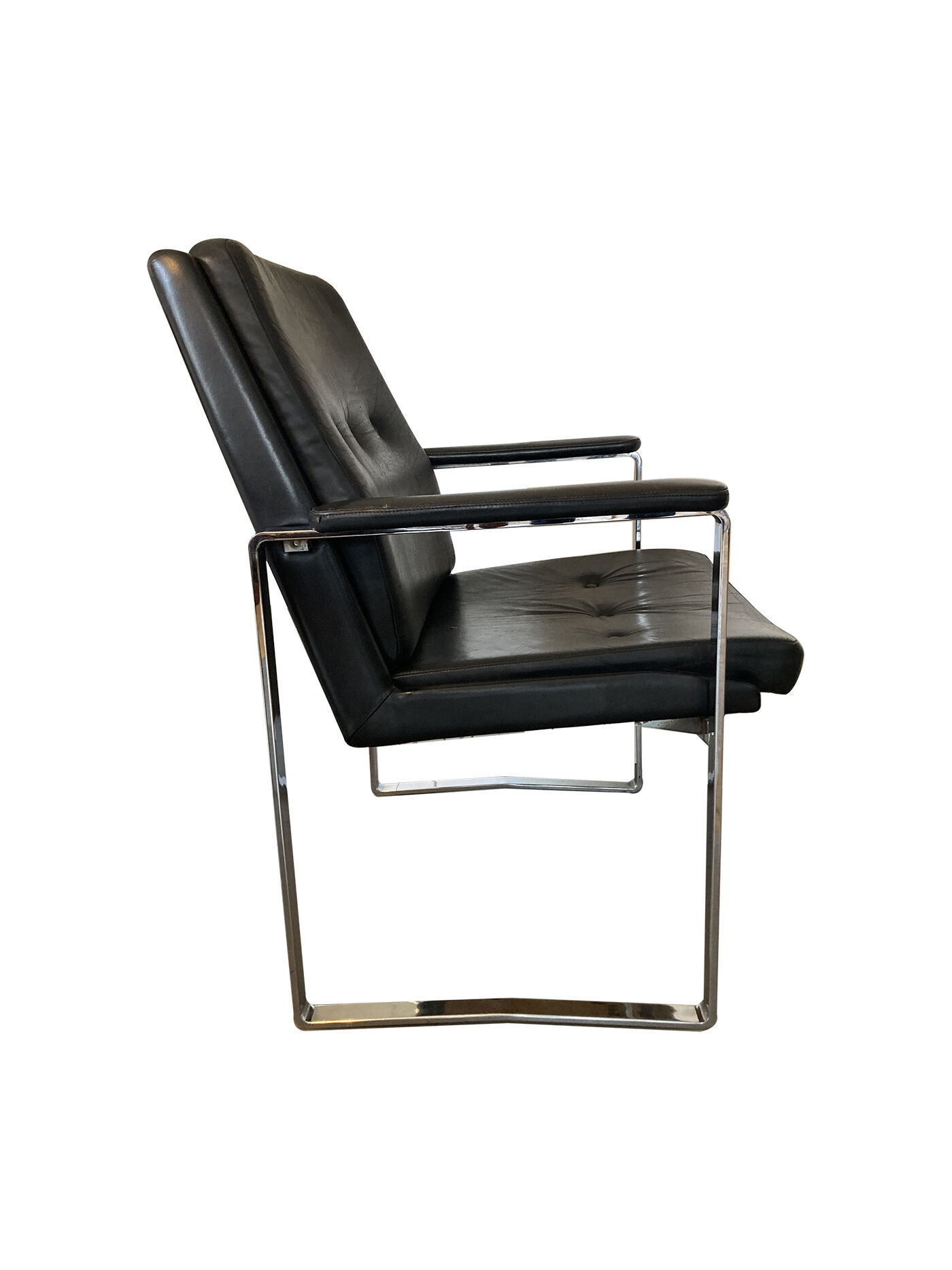 Armchair, office chair. Leather and chrome-plated steel. 1980