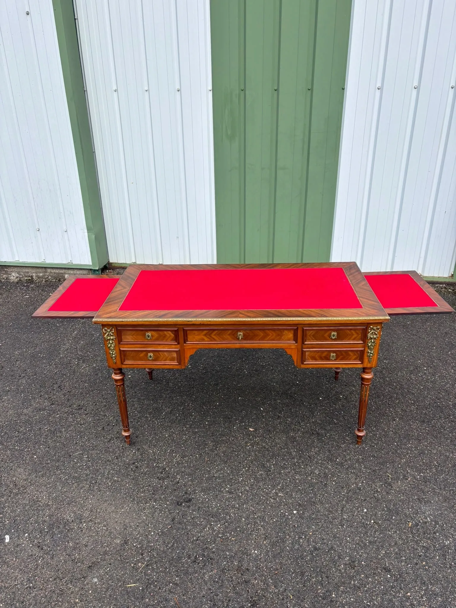Elegant flat desk in Louis XVI style made of marquetry wood.