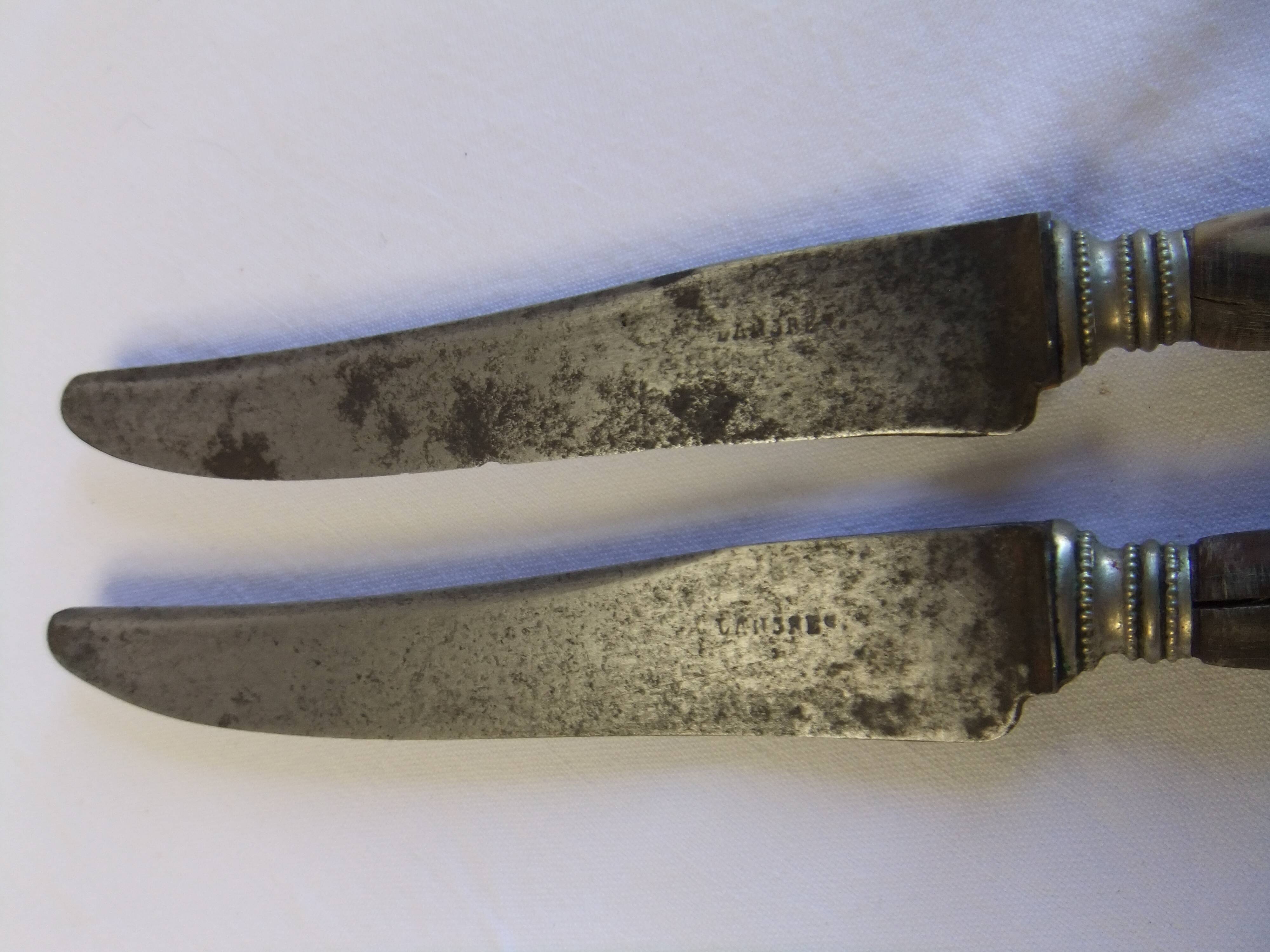 Table service knives old steel blade horn ferrule