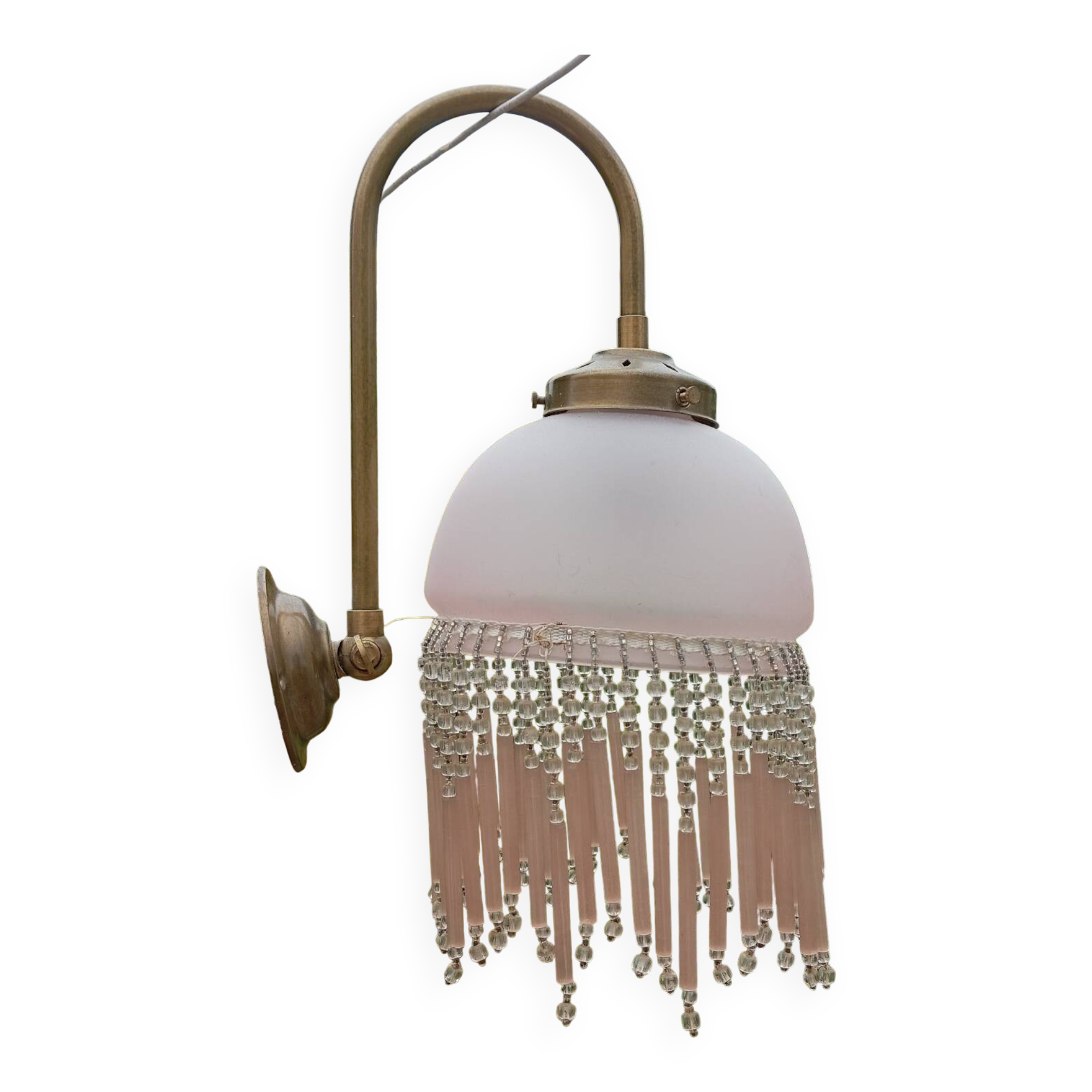 Brass swan neck wall lamp with pink glass globe and Charleston tassels