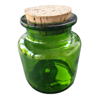 Round glass jar with cork stopper