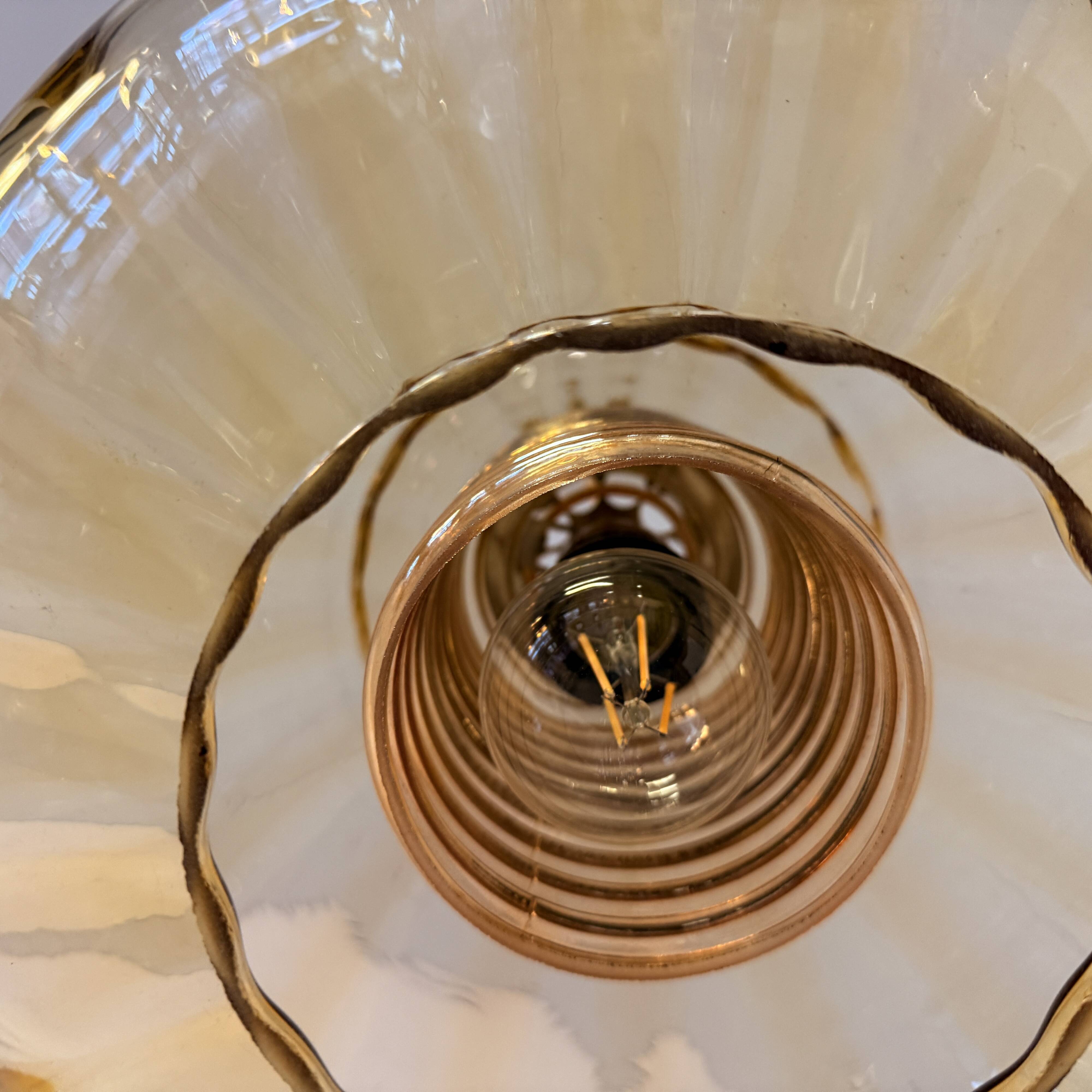 Vintage pendant lamp with amber glass shade