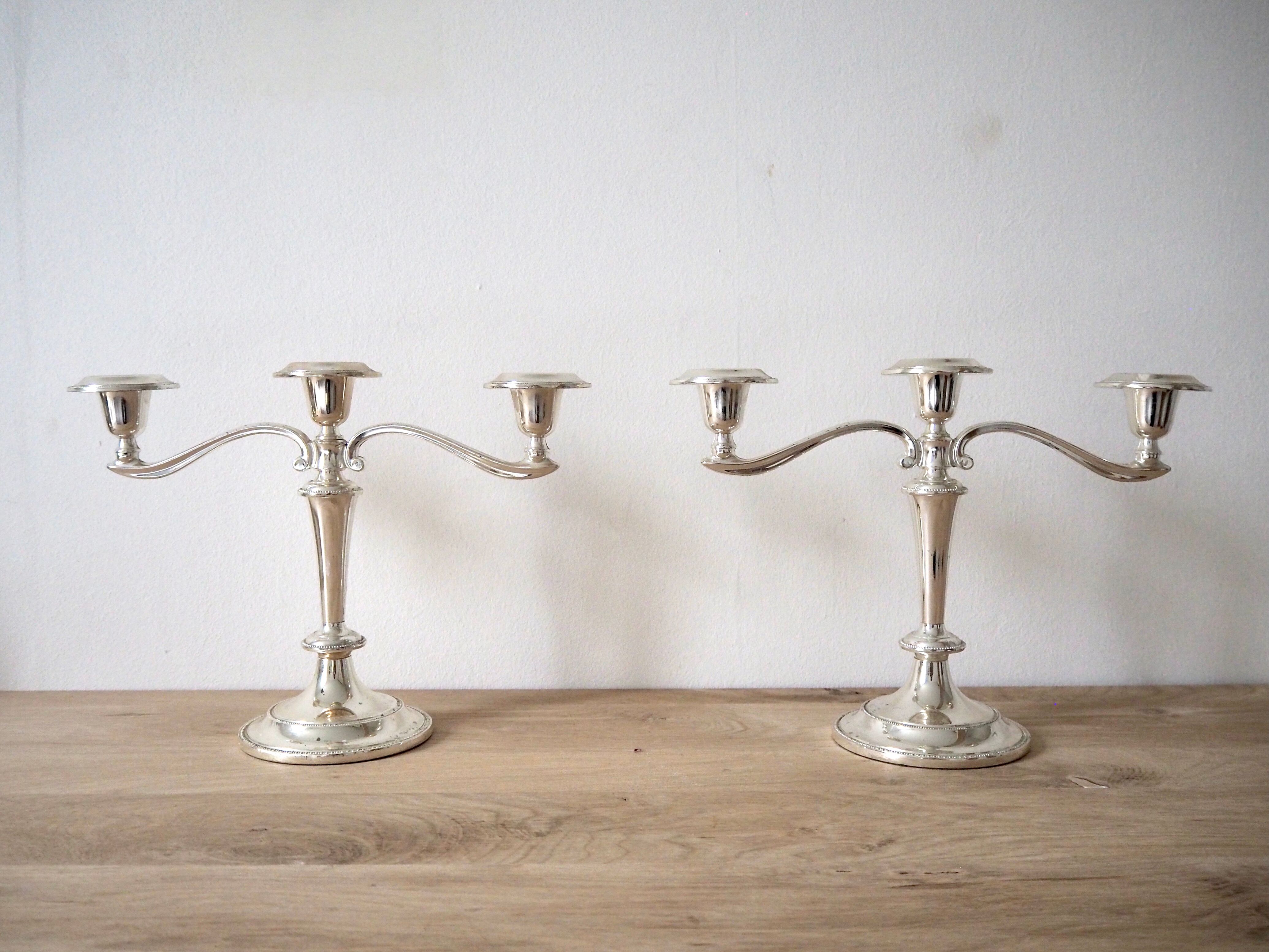 Pair of silver plated candlesticks