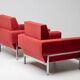 Red Kiushu armchairs by Saporiti characteristic of mid-20th century Italian modern design.