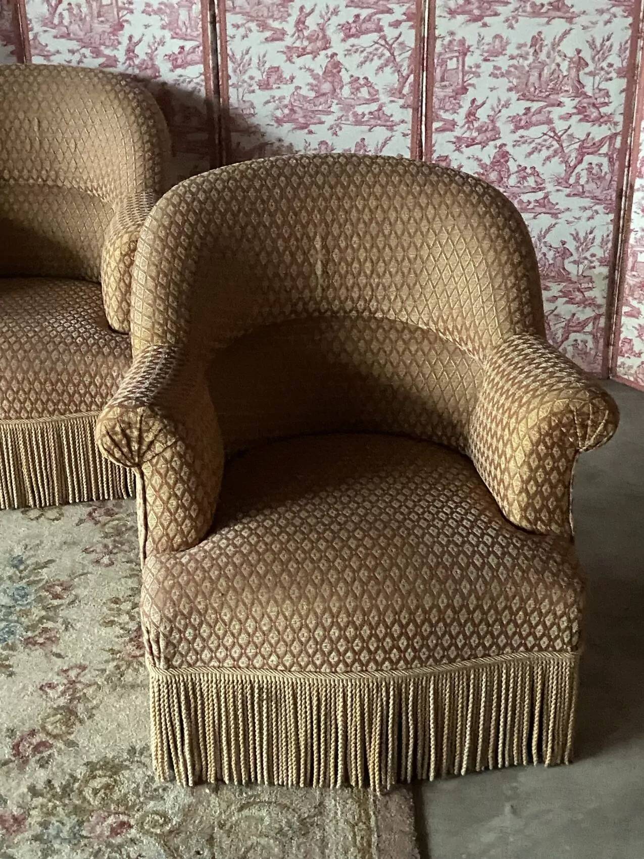 Pair of renovated upholstered frog chairs in beige velvet.