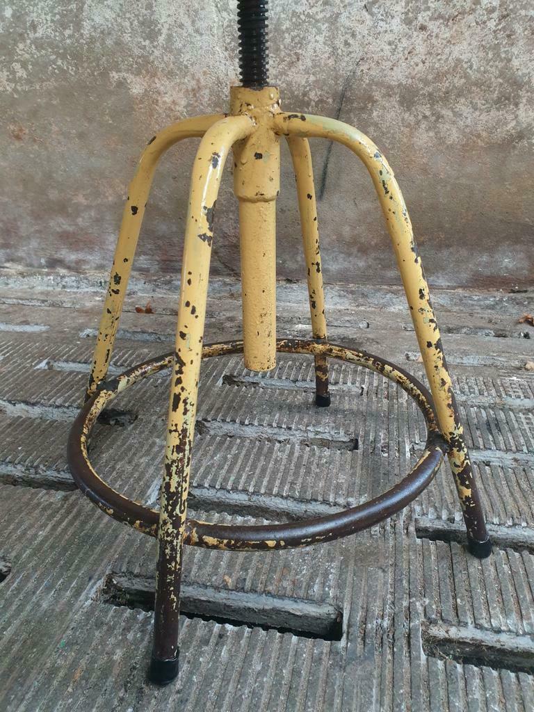 Industrial swivel stool side table