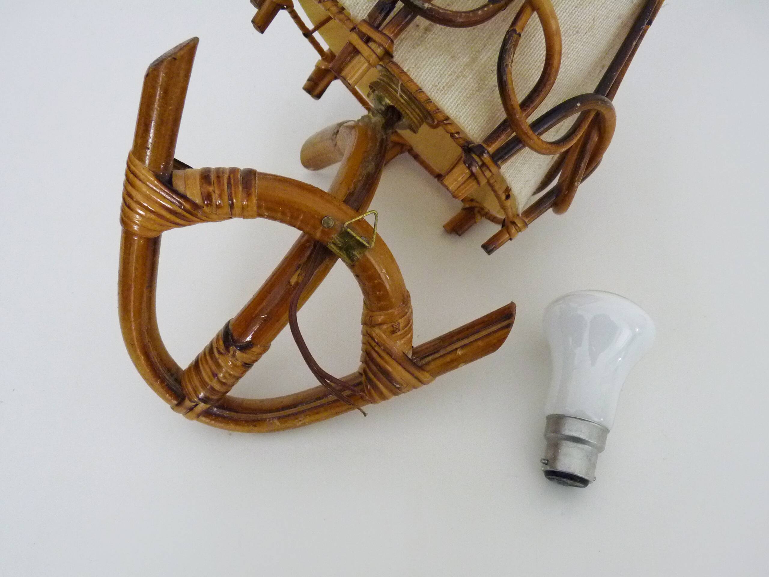 Louis Sognot rattan and bamboo wall light. 1950s