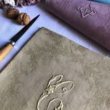 Suite of four tinted antique napkins