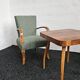 Halabala “Spider” coffee table and Hungarian late Art Deco armchairs, 1950s