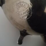 Oriental teapot in silver metal