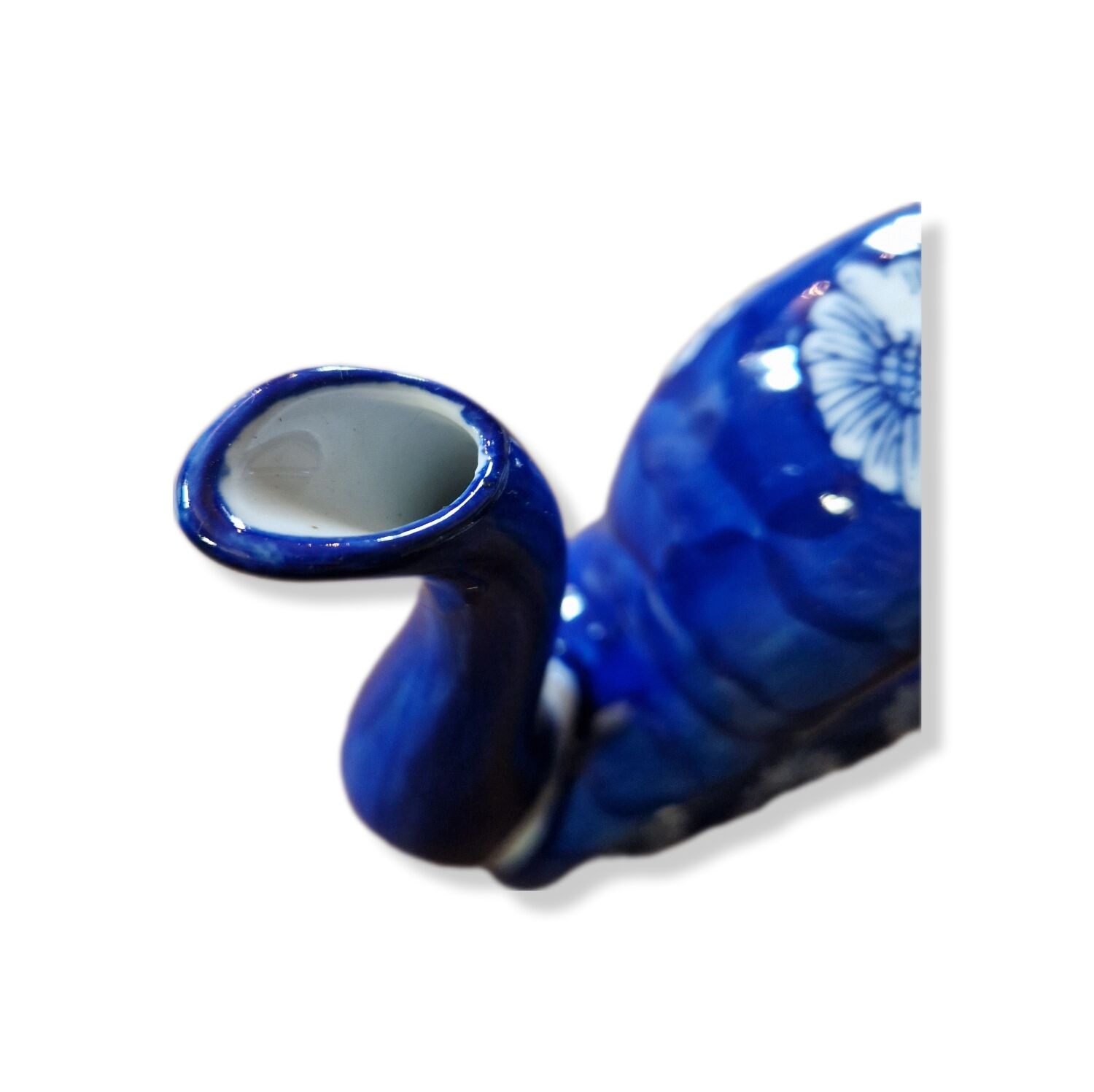 Old Asian teapot in toroidal shape in blue porcelain with floral decoration 20th century