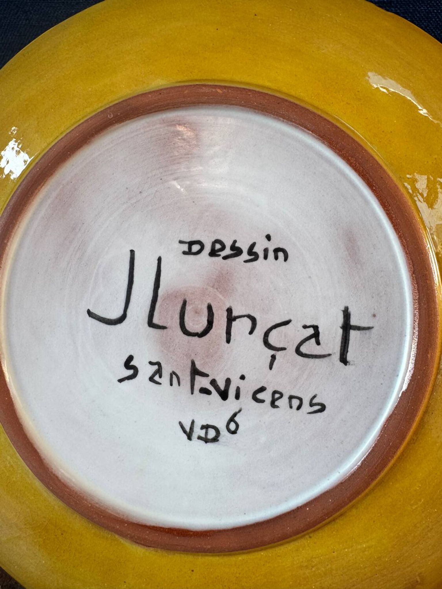 Terracotta plate, Jean Lurçat decorated with a rooster and foliage.