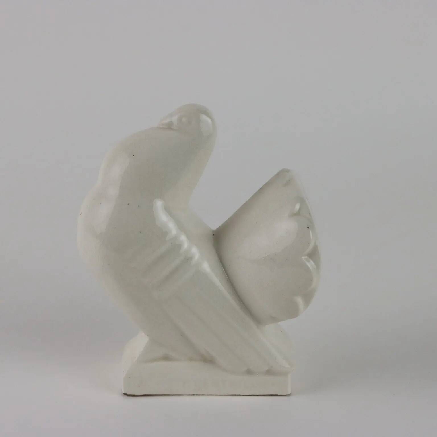 Ancient ceramic pigeon sculpture by George Ventrillon for Saint Clément.