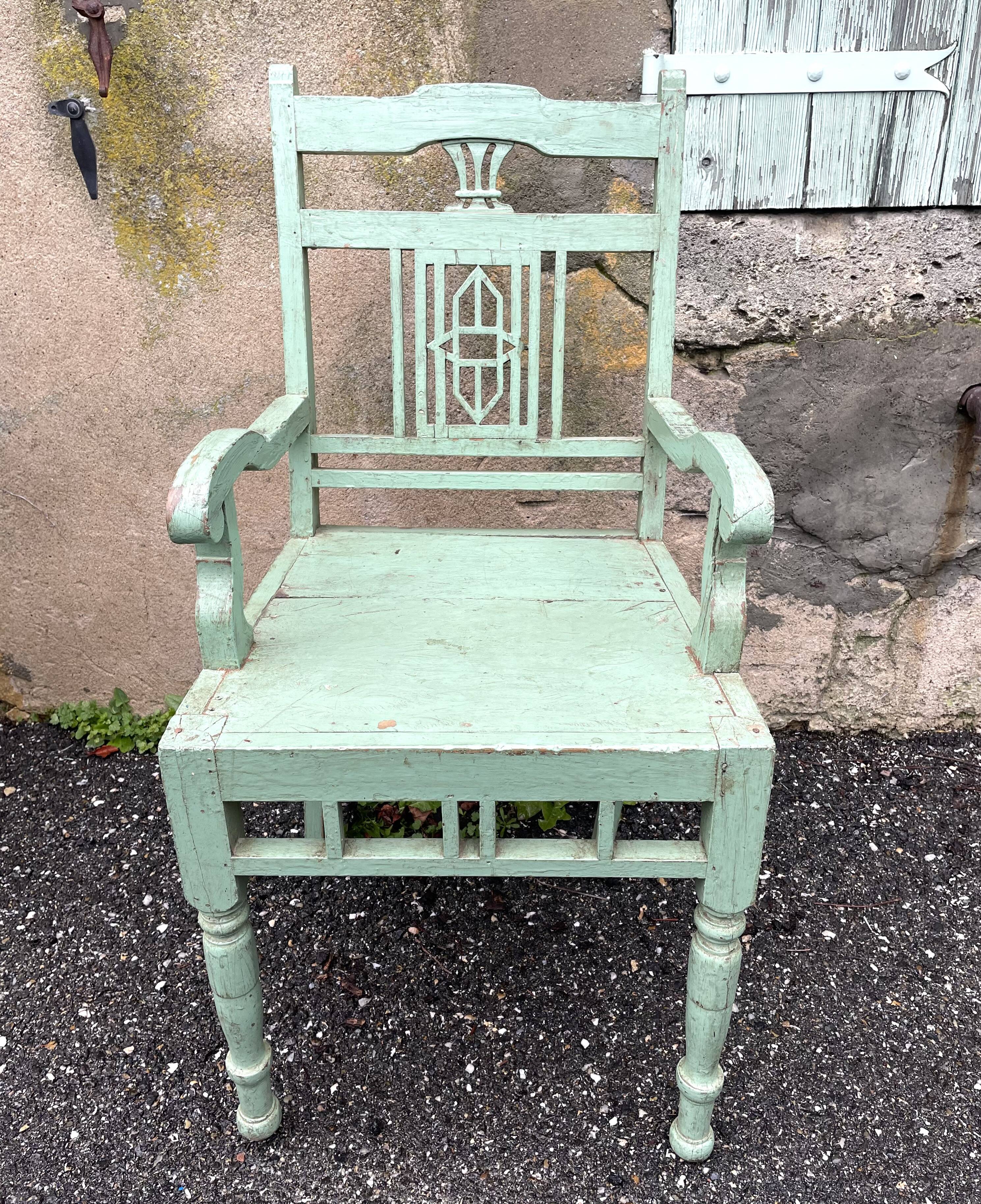 Indian chair in green lacquered wood