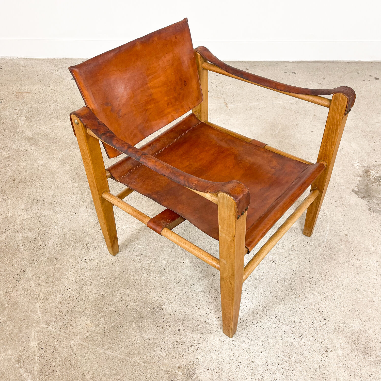 Vintage danish design cognac leather safari chair