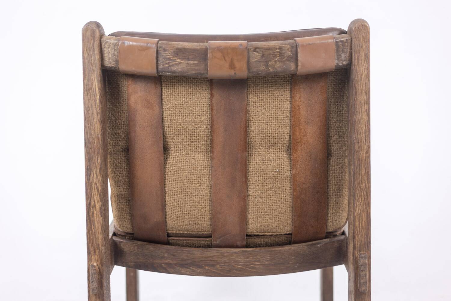 Pair of oak armchairs, upholstered in leather. Work from the 1960s.