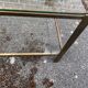 Glass and brass coffee table