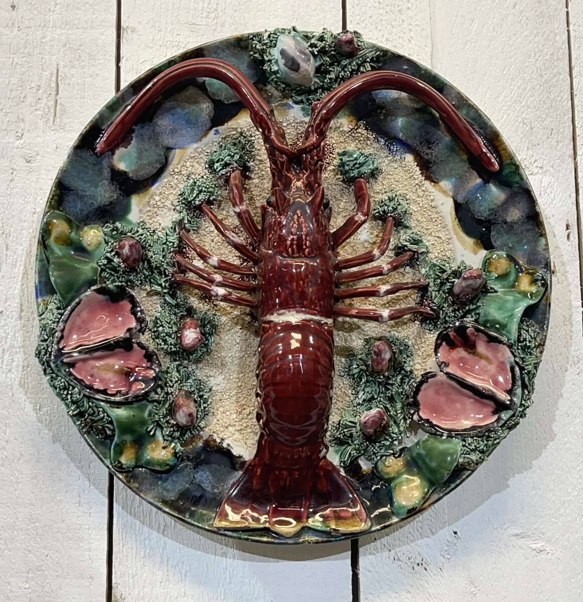 Set of 8 majolica-barbotine dishes and plates