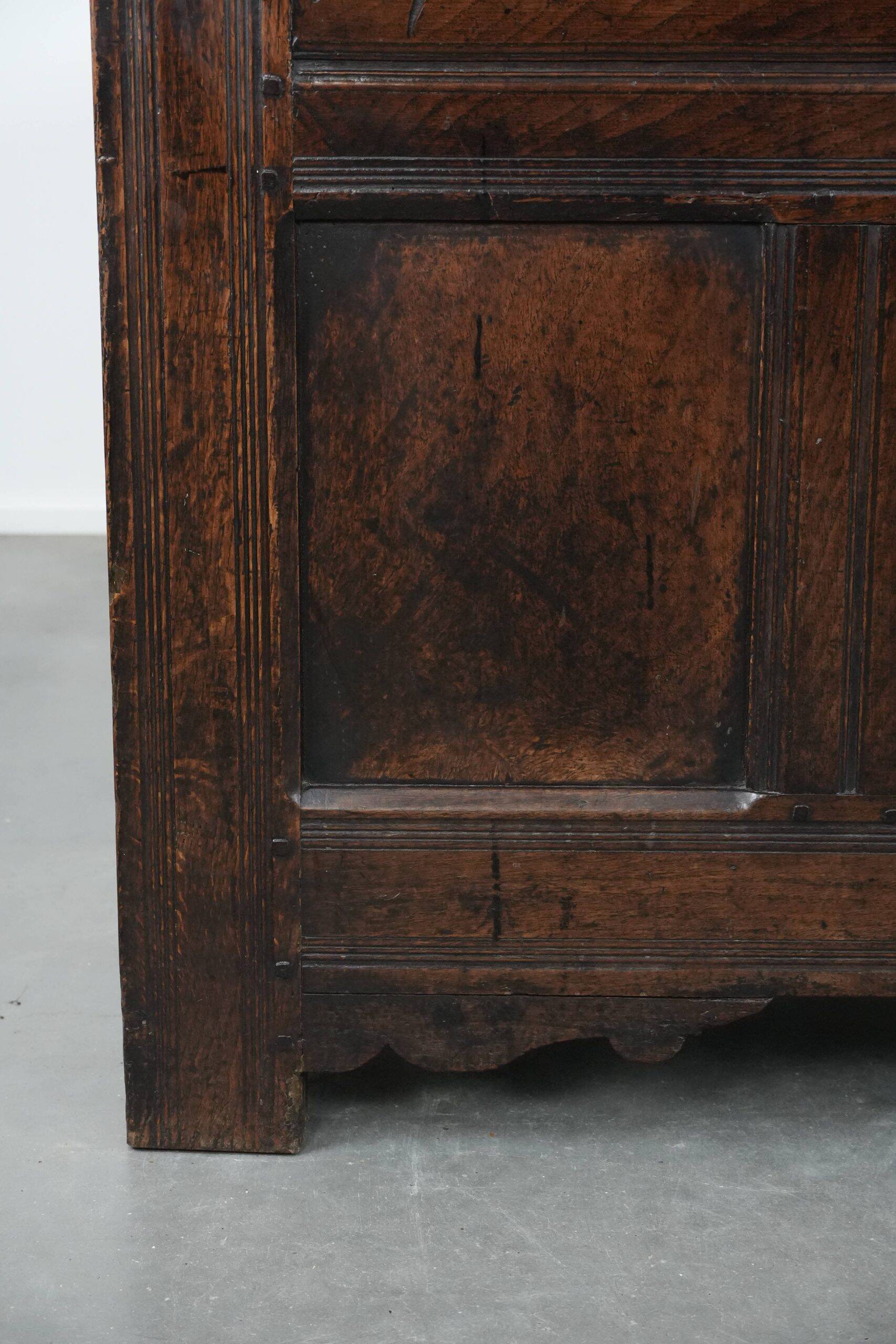 Large antique panelled English oak chest from the 18th century