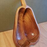 Empty wooden pocket in the shape of a vintage pear