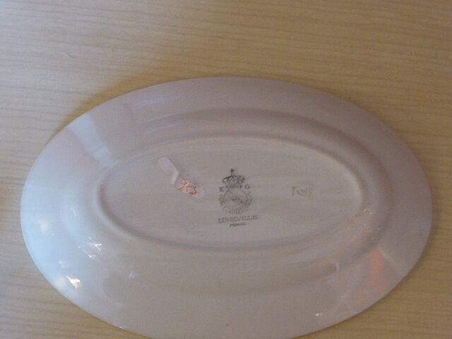 Service dish, in earthenware geometric patterns red and vintage green, stamped KG Luneville