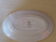 Service dish, in earthenware geometric patterns red and vintage green, stamped KG Luneville
