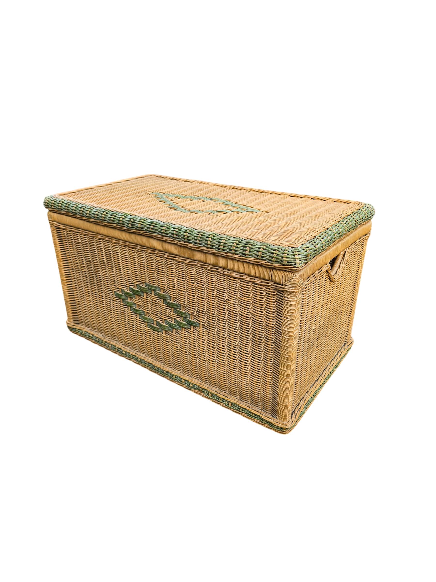 Large vintage wicker chest with green decoration.