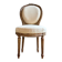 Medallion back chair in moulded wood and beige fabric.