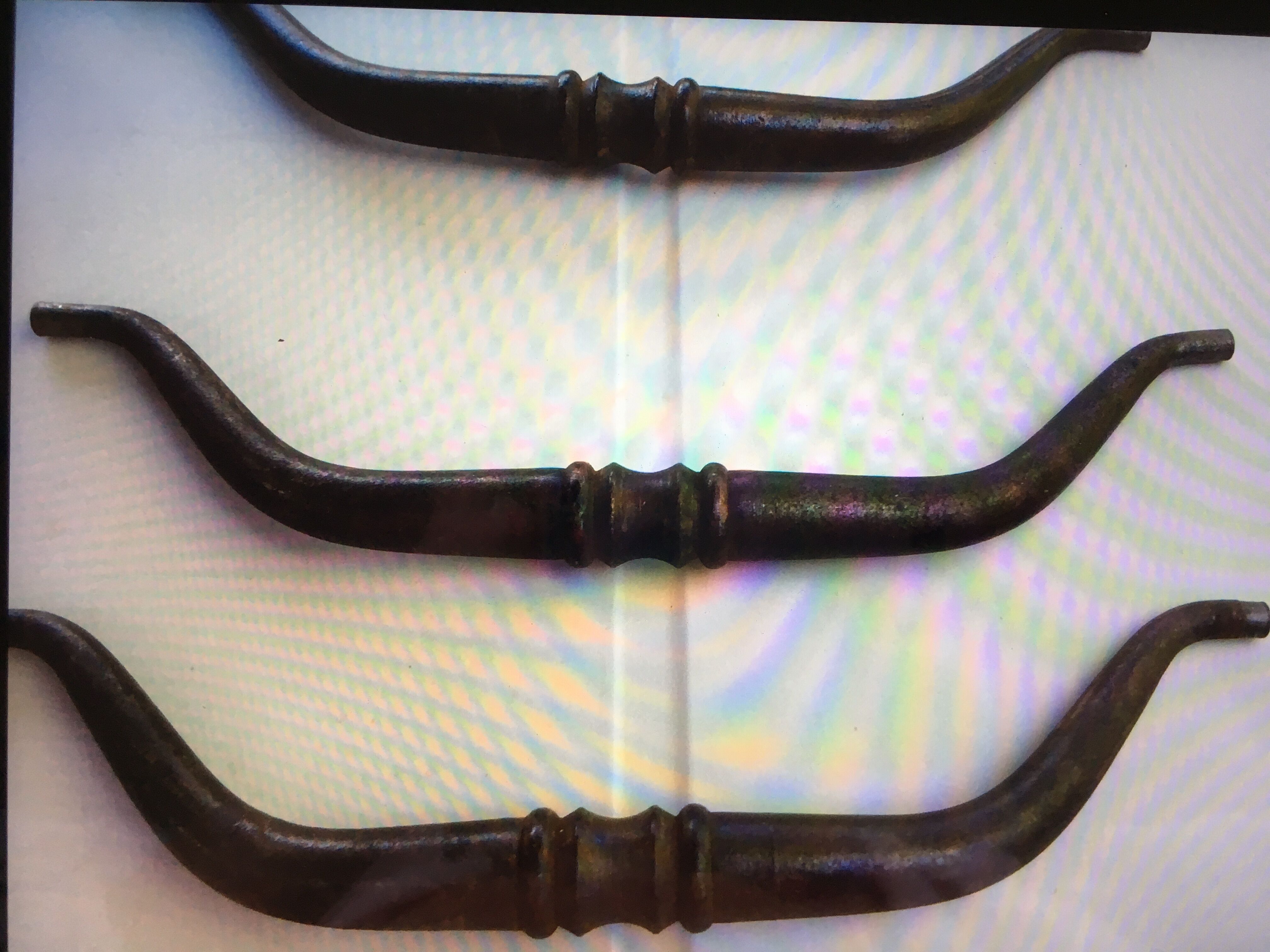 Antique metal handles.