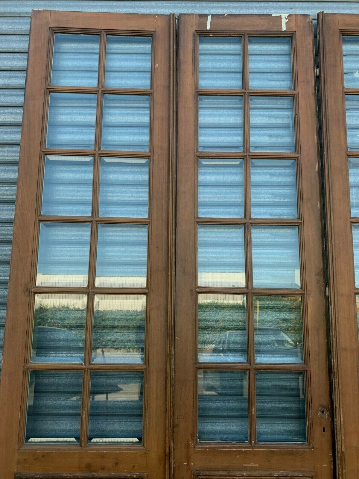 Suite of four separation doors in patinated wood Beveled tiles XX century