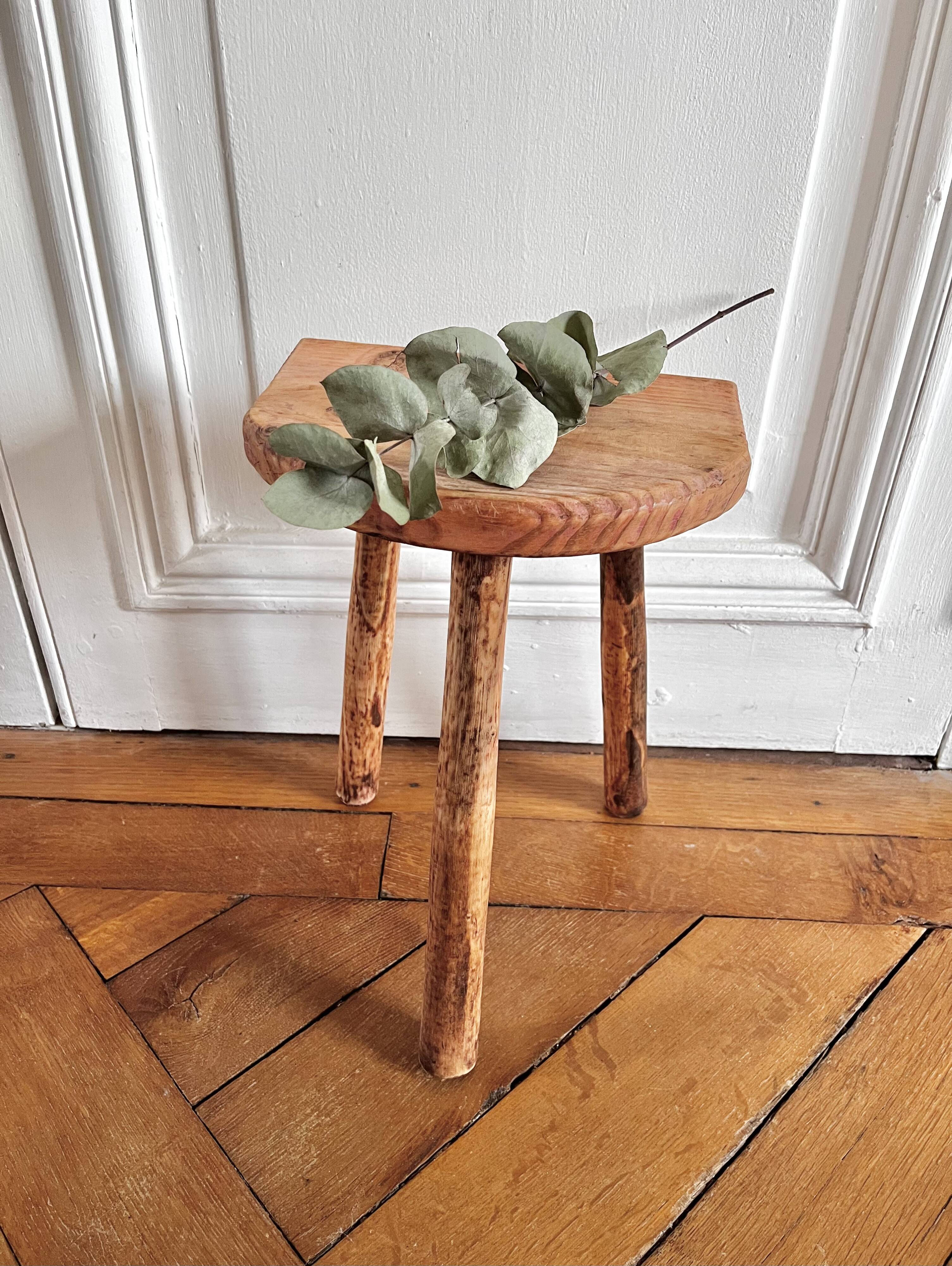 Tripod stool in raw wood