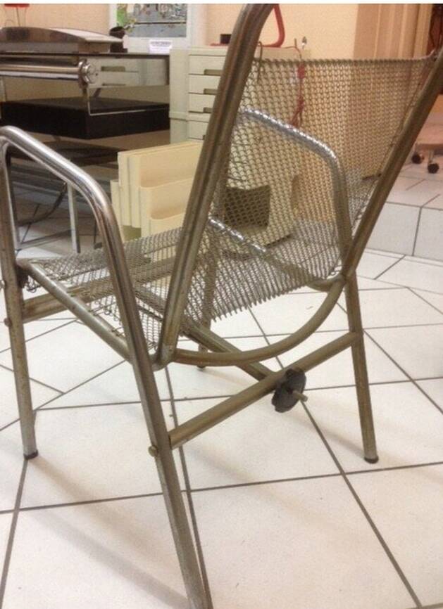 Vintage armchair in ribbed fabric and chrome steel from the 1940s France