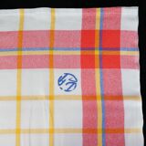 Old tablecloth and 11 towels crossed red blue