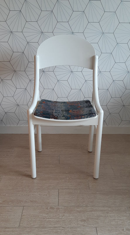White Baumann chair.