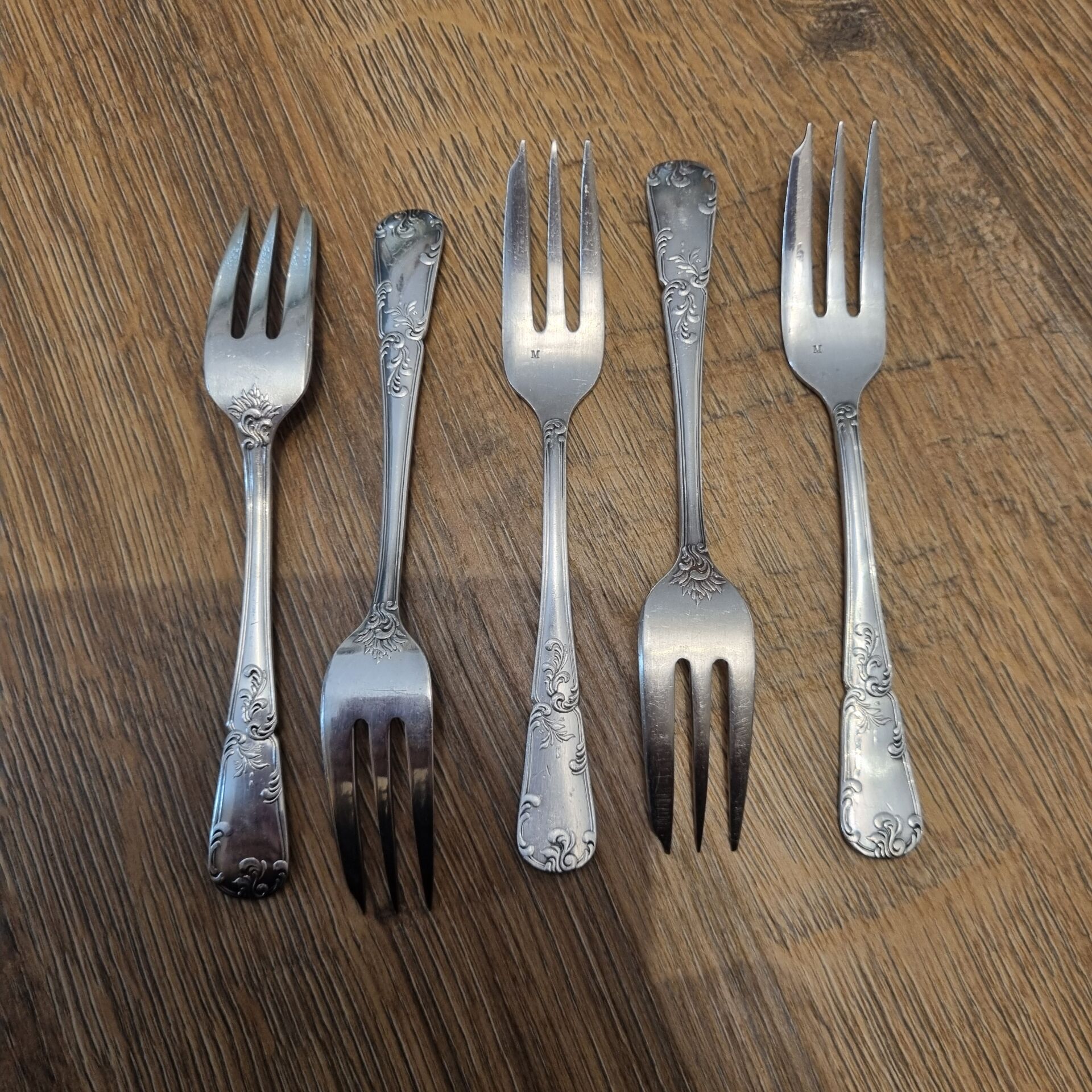 5 silver cake forks from the mid-20th century