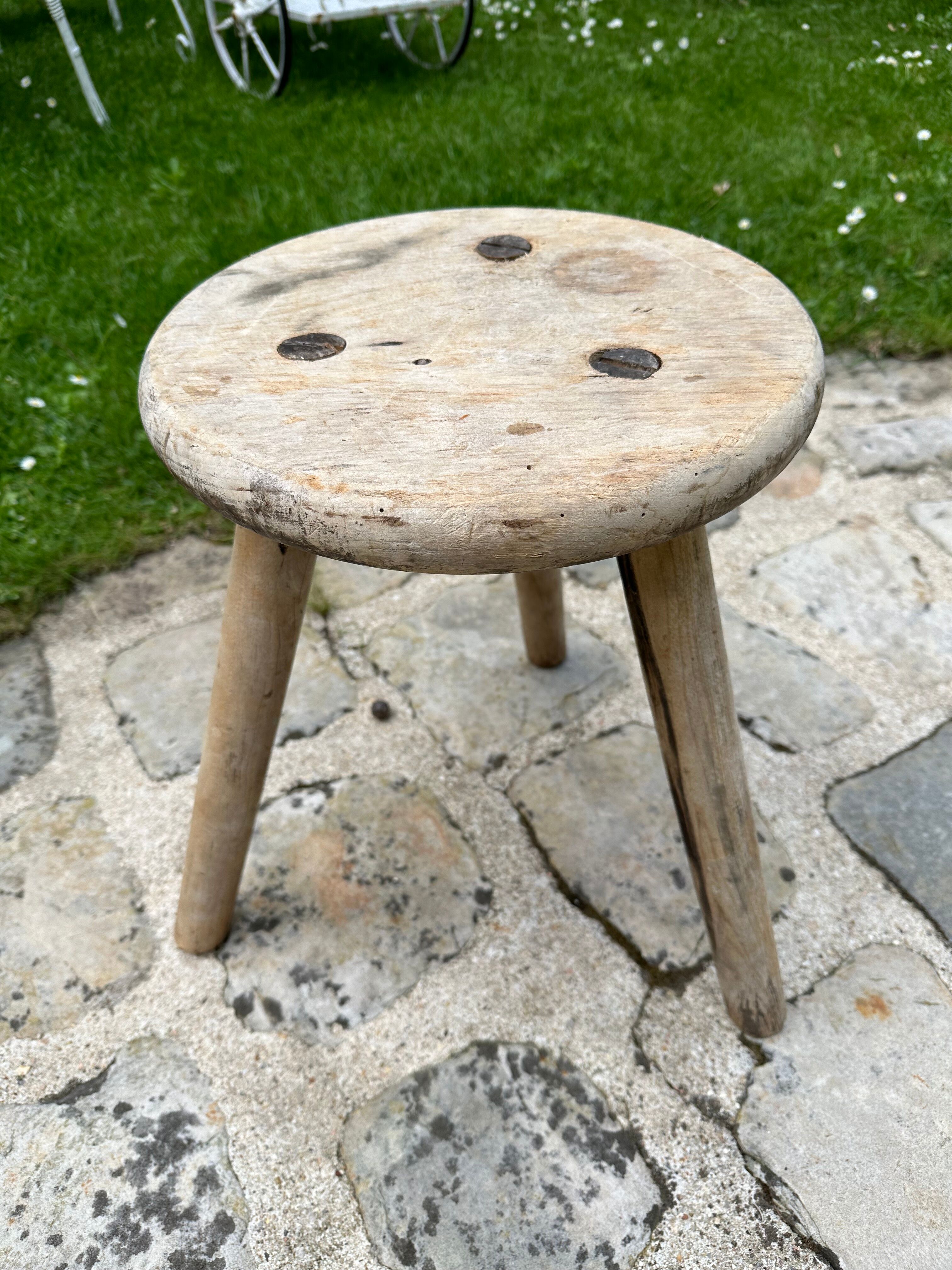 Tripod stool brutalist