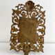 Bevelled mirror wall sconce in gilded bronze with 3 candle holders.