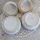Paire de bonbonnières vintage en porcelaine motif fruits et liseré doré