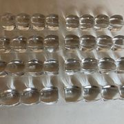 Set of 8 modernist crystal knife rests from the 1940s.