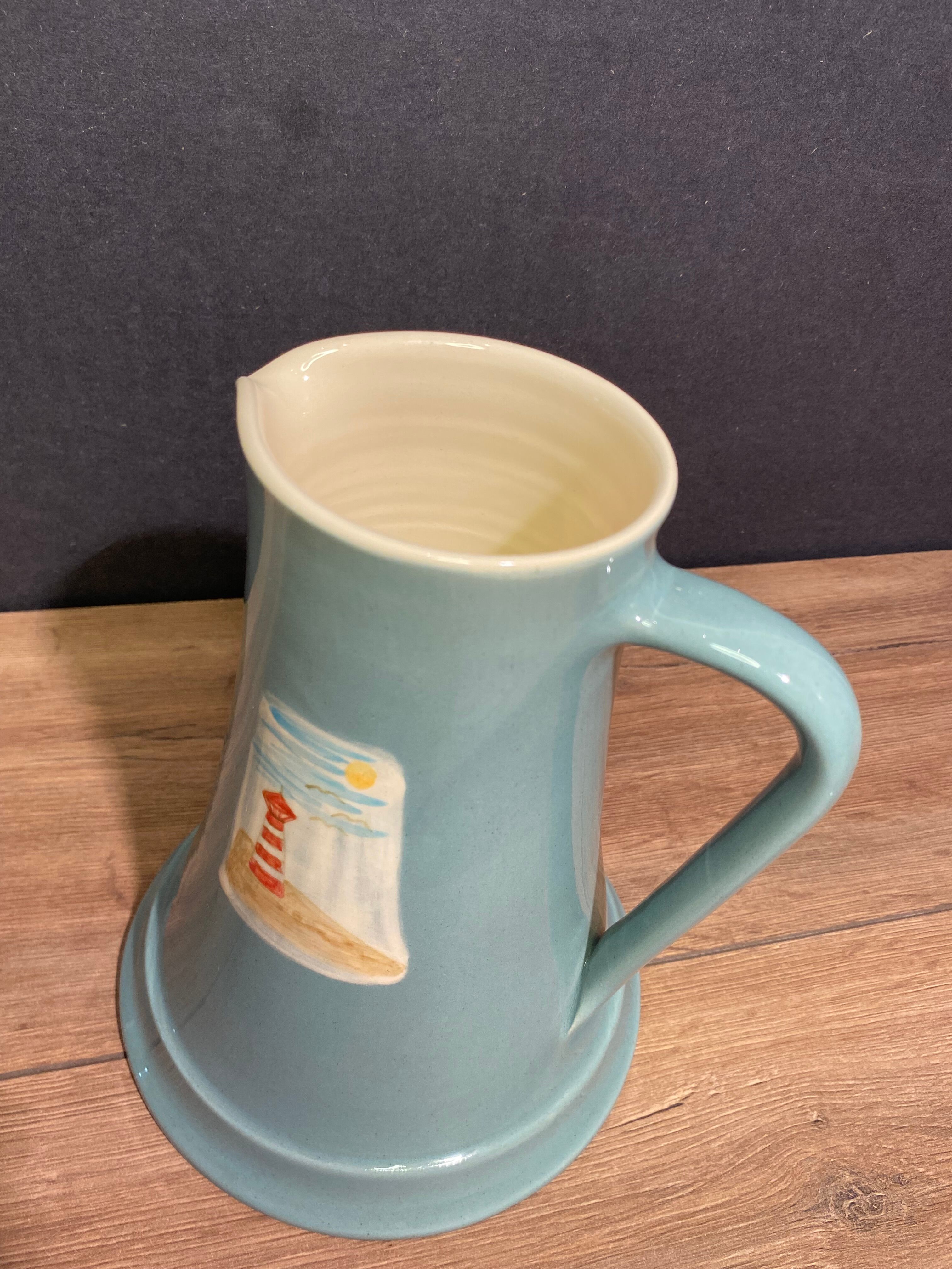 Pitcher, earthenware pitcher with headlight decoration signed Gabriella Railler